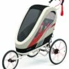 Cybex Zeno Multisport Trailer Bundle - Cream/Orange Frame + Bleached Sand Seat Pack 2 Cybex Zeno Multisport Trailer Bundle - Cream/Orange Frame + Bleached Sand Seat Pack -Babyzen || Baby Jogger Shop cybex zeno multisport trailer bundle cream orange frame bleached sand seat pack 193