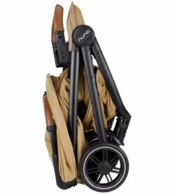Nuna TRVL Self-Folding Compact Stroller - Camel -Babyzen || Baby Jogger Shop nuna trvl self folding compact stroller camel 153